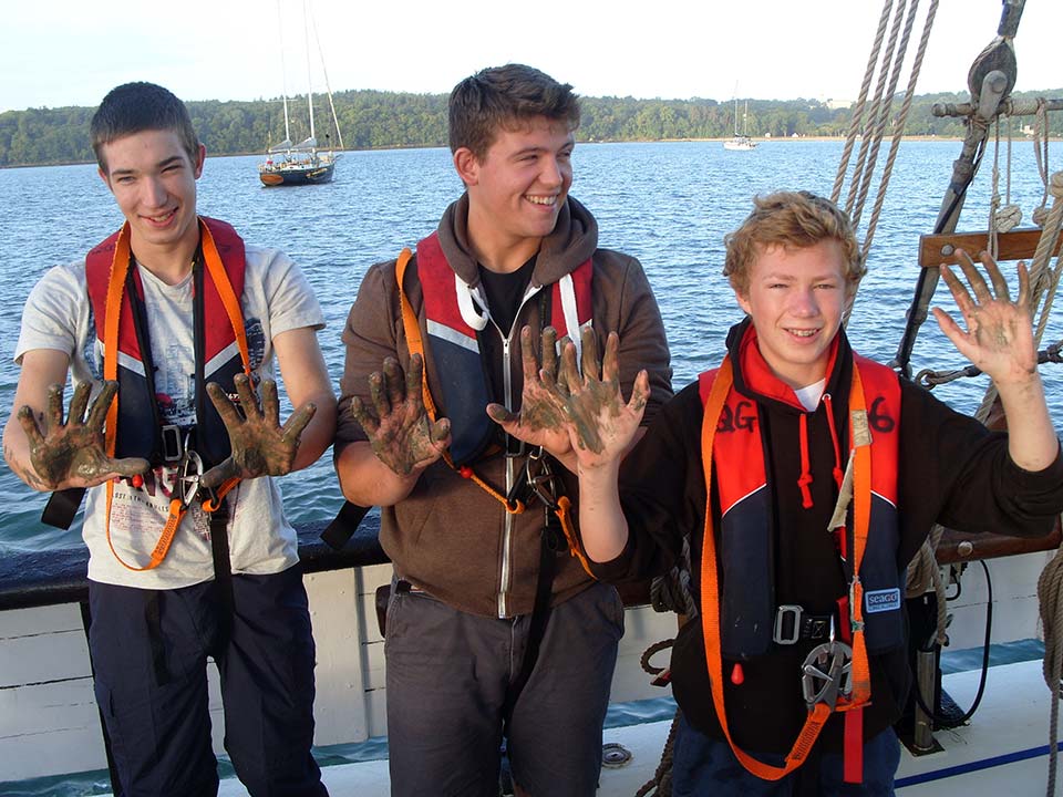 Muddy hands whilst sailing